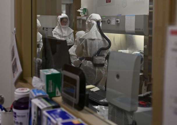 people in BSL-3 suits